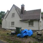 HOUSE PRIMED BY BRUSH